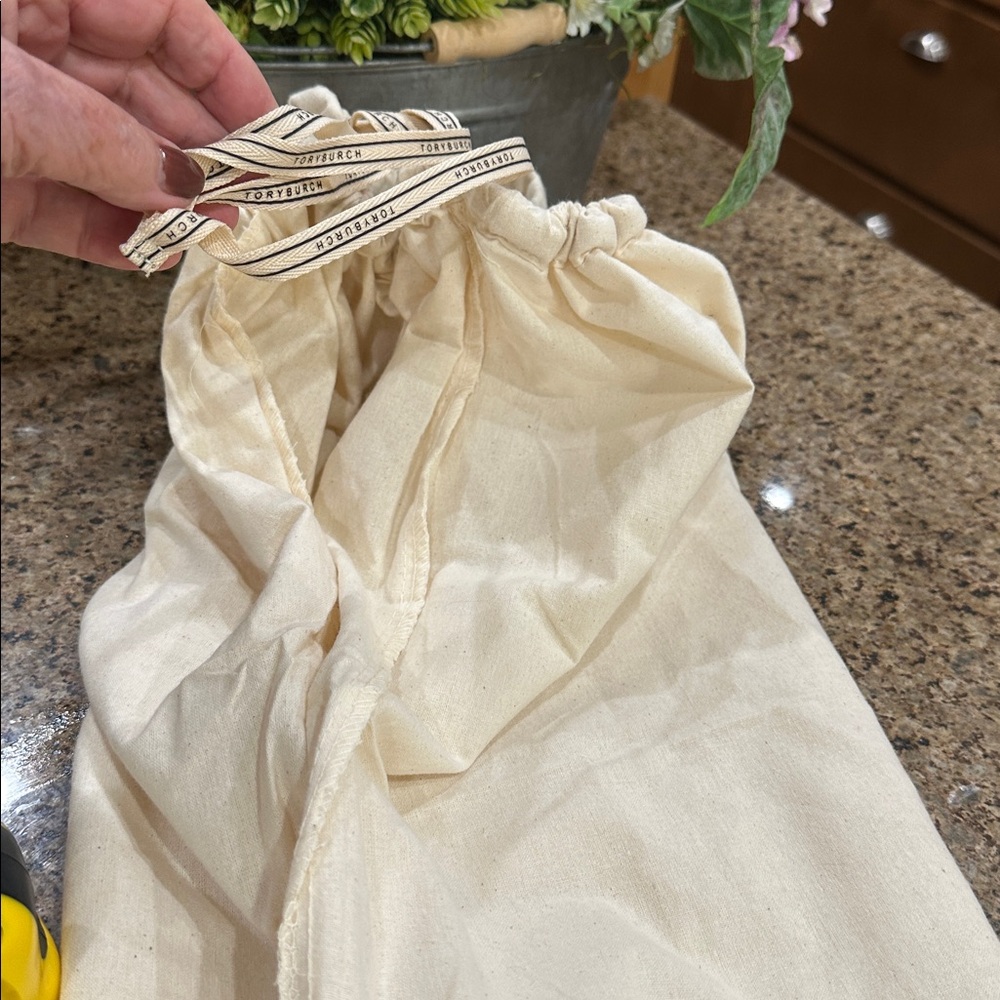 Tory Burch cotton dust bag in cream with drawstring closure, extra large